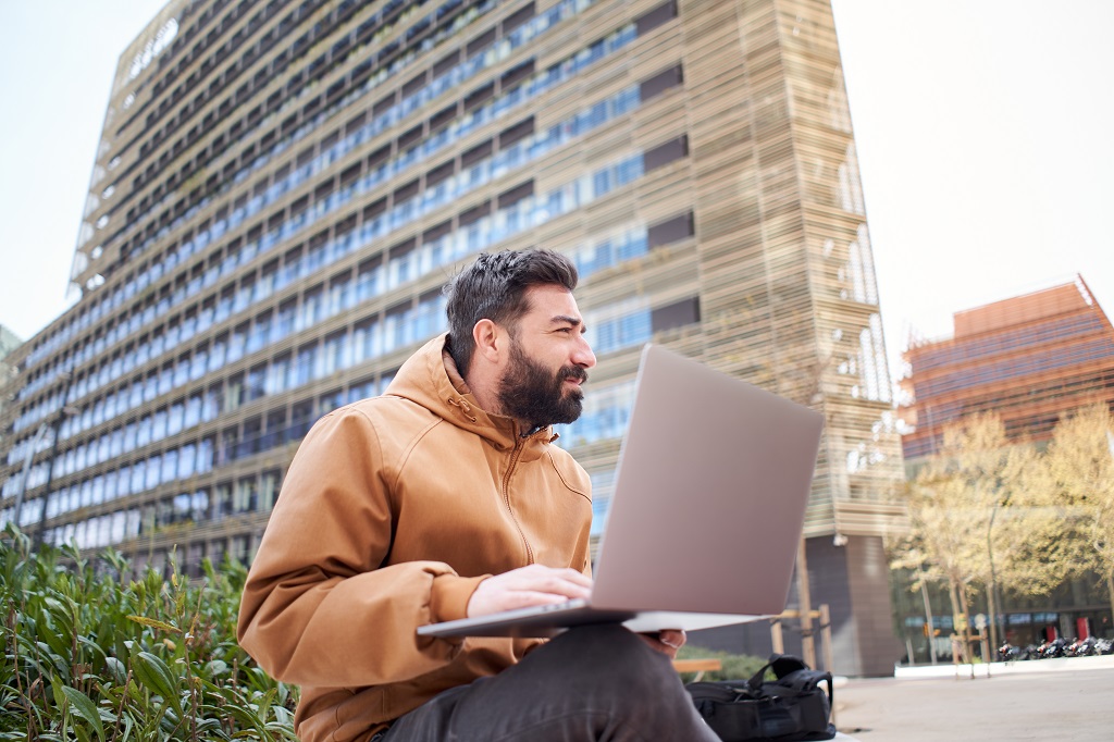 a federal job seeker conducting research on his laptop about what is ksa 