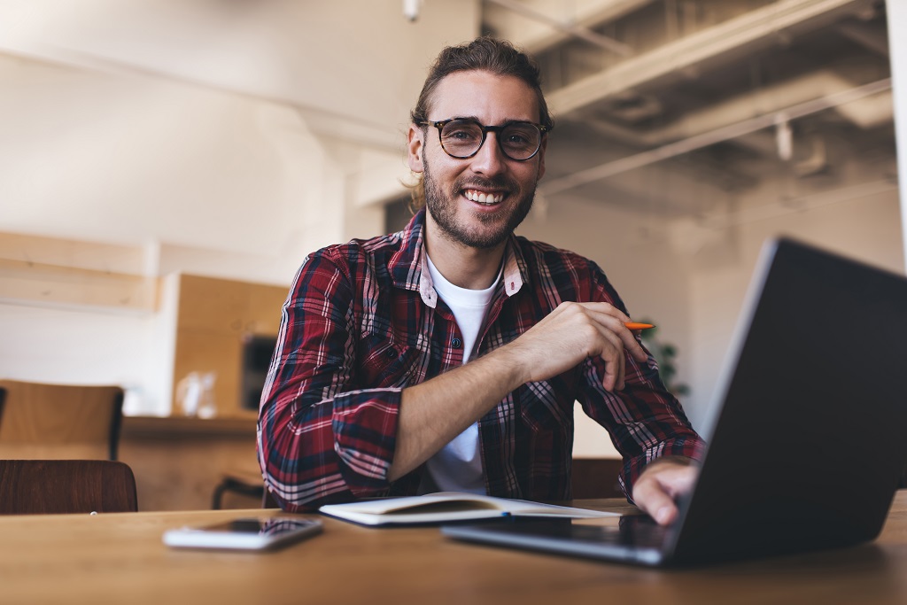 an IT professional passionately working in his office