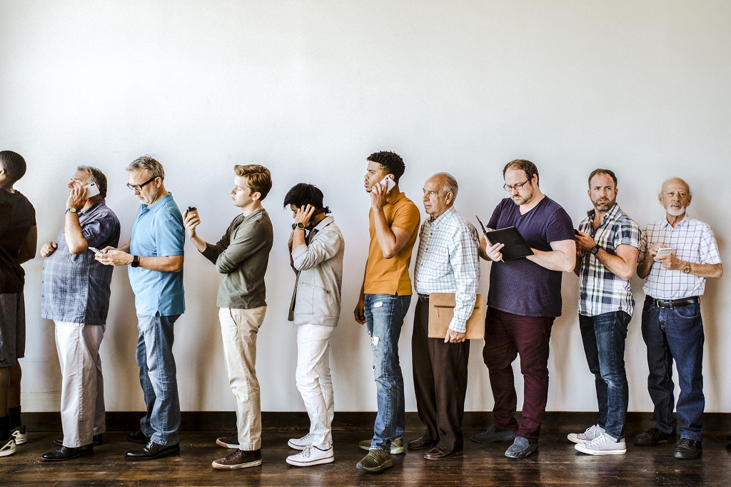 federal job applicants waiting in line for a job interview