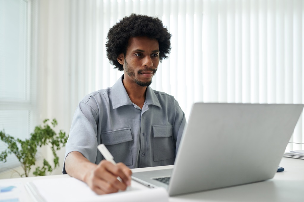 job seeker writing his resume with sincerity and authenticity