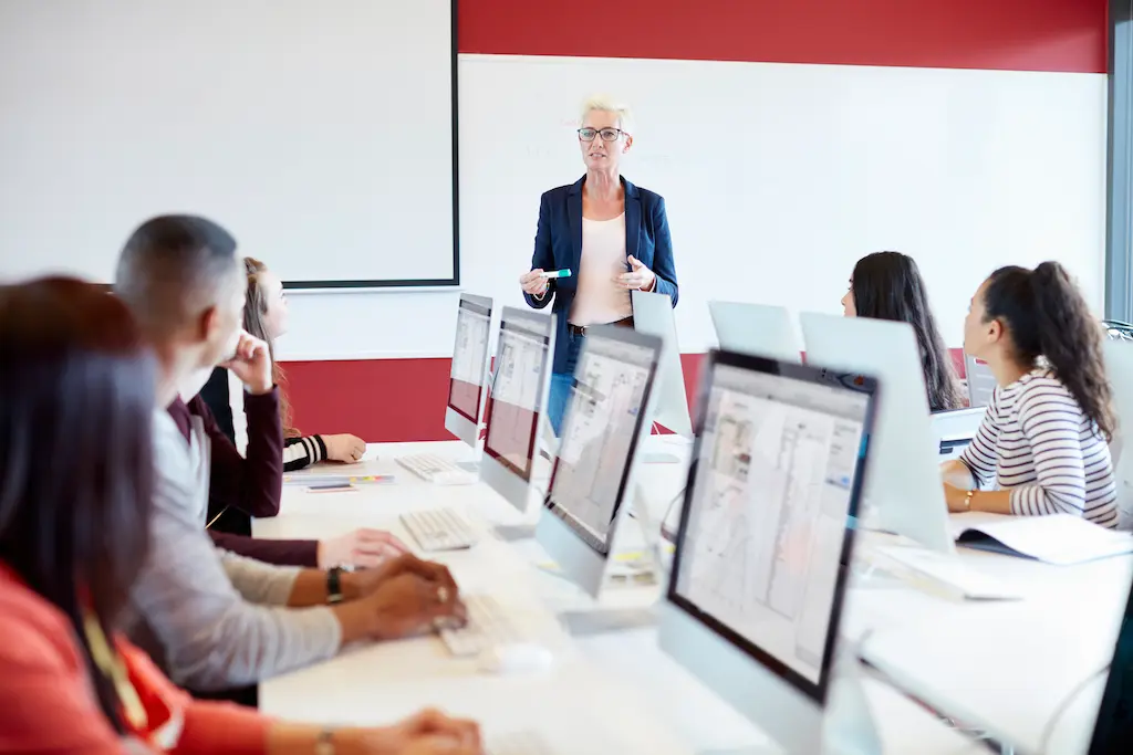 it professionals attending a training session to earn certifications on resume