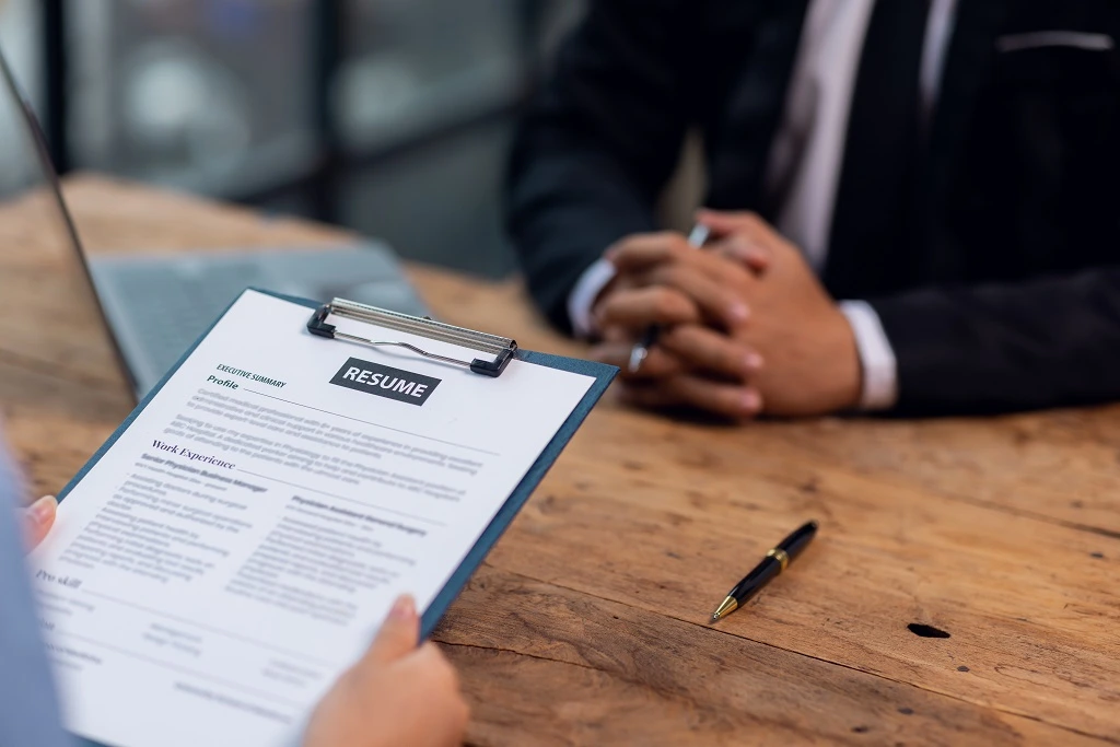 it professional discussing references on resume on hiring manager