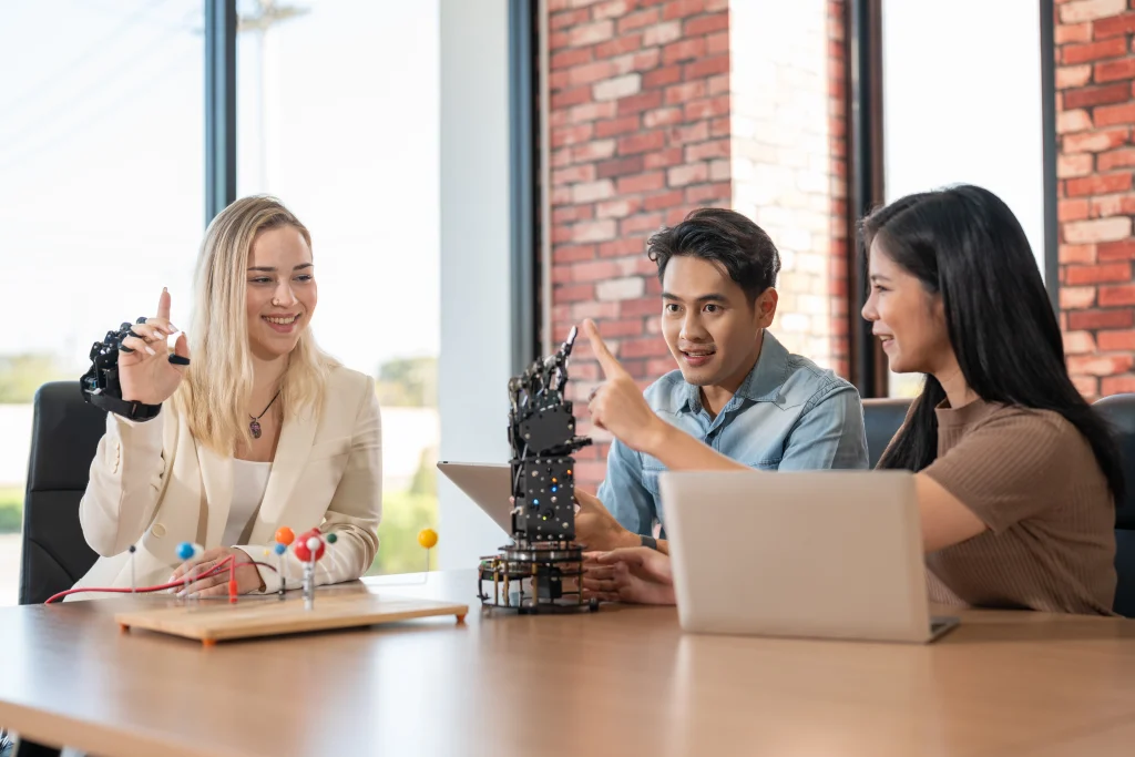 young professionals learning a engineer skills through coding and data analysis